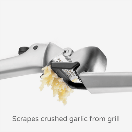 Garject/Presses unpeeled garlic and scrapes itself clean